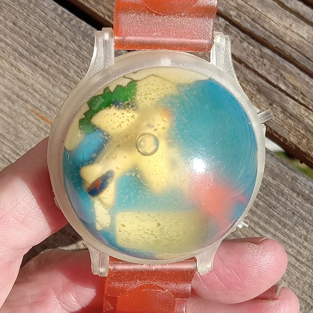 Vintage Bubble Watch with Rotating Airplane, New Red Plastic Band, Needs battery